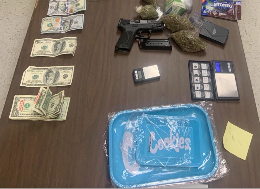 A man is in custody after he was caught with drugs, cash, a firearm, and other drug paraphernalia in a traffic stop Monday on Highway 482.